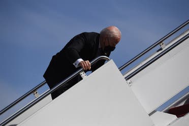President Joe Biden stumbles while boarding Air Force One, March 19, 2021. (AFP)