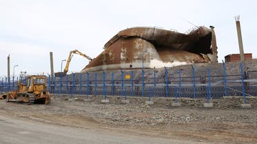 A view shows the TPP-3 power plant, owned by NTEK, a subsidiary of Russian mining company Norilsk Nickel, during works for the demolition of the fuel tank which collapsed on May 29, resulting in a spill of diesel fuel, in Norilsk, Russia July 30, 2020. (Reuters)