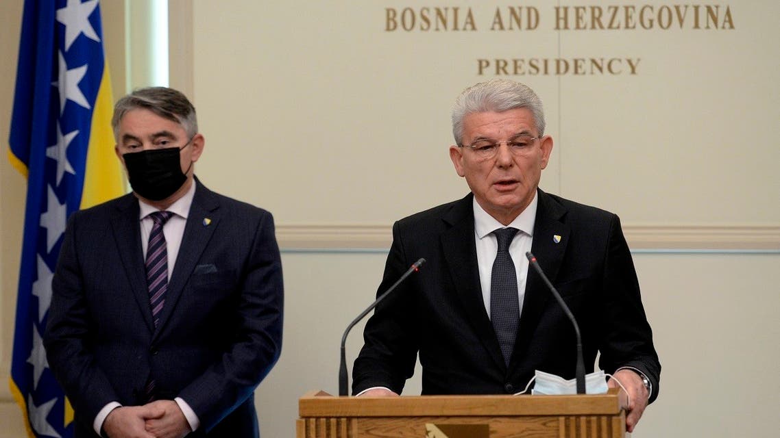 Croat member of the tripartite Presidency of Bosnia Zeljko Komsic (left), listens as Muslim member Sefik Dzaferovic make a statement after refusing to meet with Russian Foreign Minister Sergey Lavrov in the capital Sarajevo, Bosnia, on December 15, 2020. (AP)