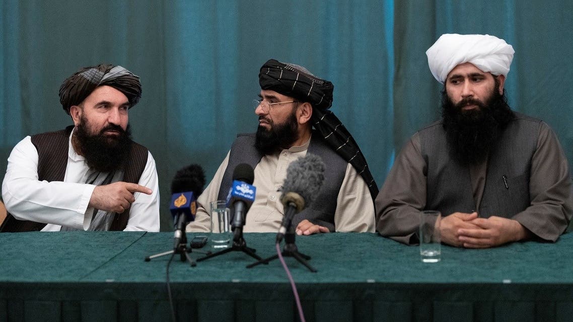 Members of the Taliban delegation: former western Herat Governor Khairullah Khairkhwa, member of the negotiation team Suhail Shaheen and spokesman for the Taliban's political office Mohammad Naeem attend a joint news conference in Moscow, Russia, on March 19, 2021. (Reuters)