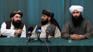 Members of the Taliban delegation: former western Herat Governor Khairullah Khairkhwa, member of the negotiation team Suhail Shaheen and spokesman for the Taliban's political office Mohammad Naeem attend a joint news conference in Moscow, Russia, on March 19, 2021. (Reuters) 