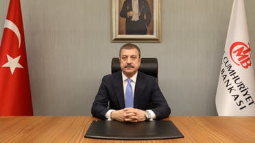 Turkey’s new Central Bank Governor Sahap Kavcioglu sits at his office in Ankara, Turkey March 21, 2021. (Turkish Central Bank/Handout via Reuters)