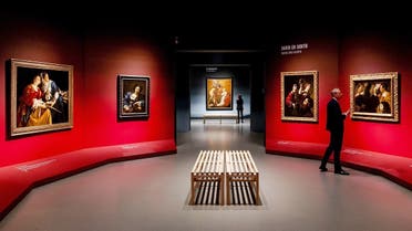 Italy’s Caravaggio’s master piece “The burial of Christ” (C) is displayed at the exhibition “Utrecht, Caravaggio and Europe”at the Centraal Museum in Utrecht on December 13, 2018. (AFP)