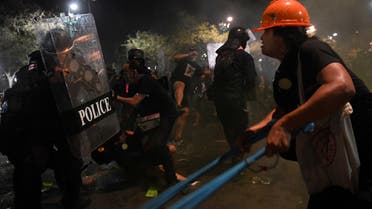Demonstrators clash with riot police during an anti-government protest in Bangkok, Thailand, March 20, 2021. (File photo: Reuters)