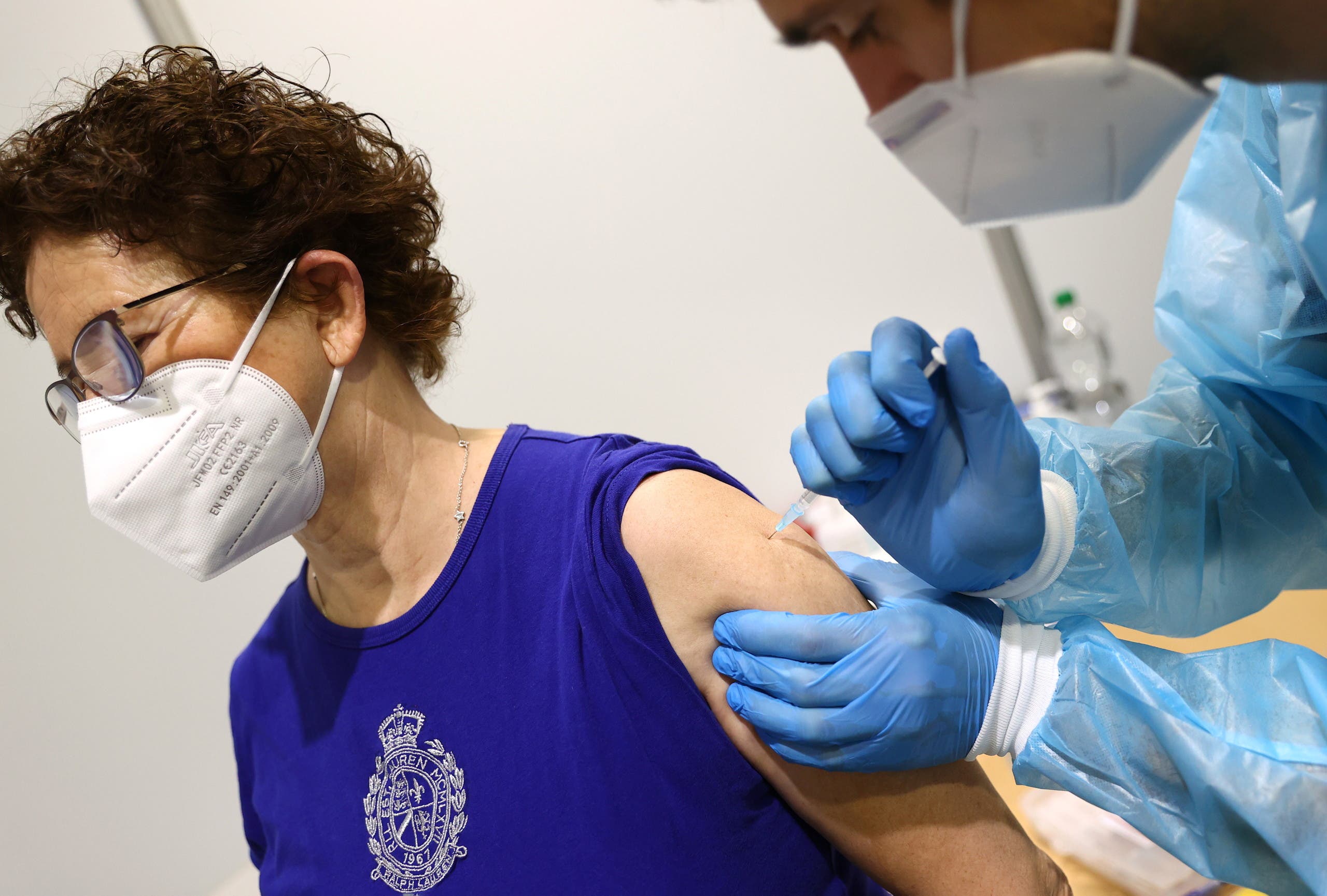 A woman gets her AstraZeneca COVID-19 vaccine at the local vaccination centre as the spread of the coronavirus disease (COVID-19) continues in Hagen, Germany. (Reuters)