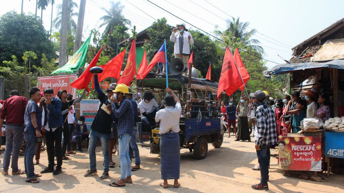 This handout photo taken and released by Dawei Watch on March 21, 2021 shows protesters taking part in a demonstration against the military coup in Launglone township in Myanmar's Dawei district.