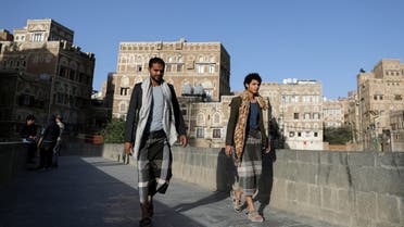 People walk in the old quarter of Sanaa, Yemen March 22, 2021. (Reuters)