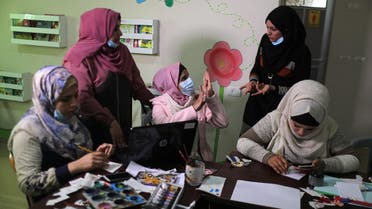 Hearing-impaired Palestinian women attend a lesson as they learn to make animation films in the central Gaza Strip March 18, 2021. (Reuters/Mohammed Salem)