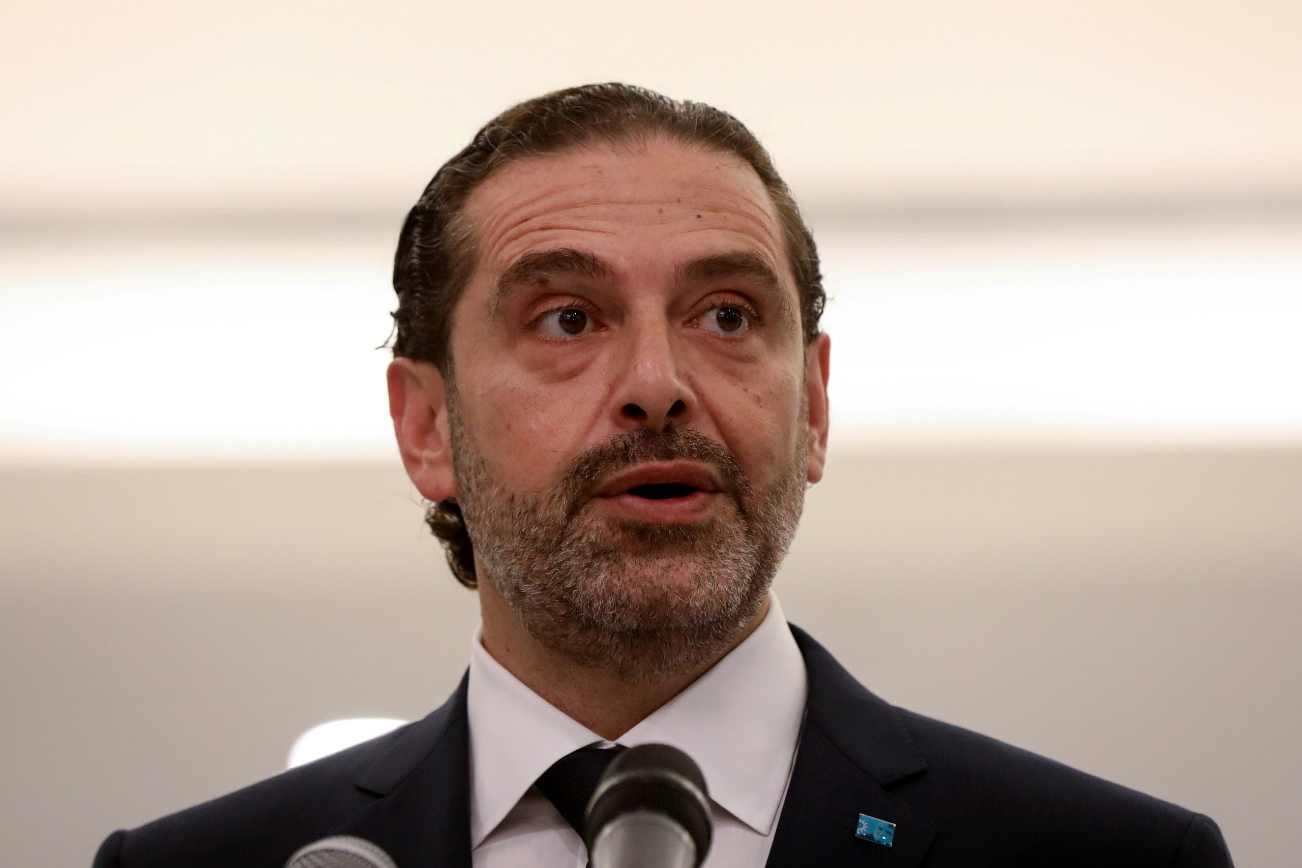 Prime Minister-designate Saad al-Hariri speaks after meeting with Lebanon's President Michel Aoun at the presidential palace in Baabda, Lebanon March 22, 2021. (Reuters)
