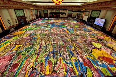 A view shows the giant canvas painted by British artist Sacha Jafri, who partnered with UNICEF and UNESCO looking to raise up $30 million from selling the painting and donating them to children’s charities, at The Atlantis hotel in Dubai, UAE, on September 20, 2020. (Reuters)