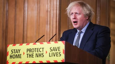 Britain's Prime Minister Boris Johnson holds a news conference at 10 Downing Street, on the day of reflection to mark the anniversary of Britain's first coronavirus disease (COVID-19) lockdown, in London, Britain March 23, 2021. (Reuters)