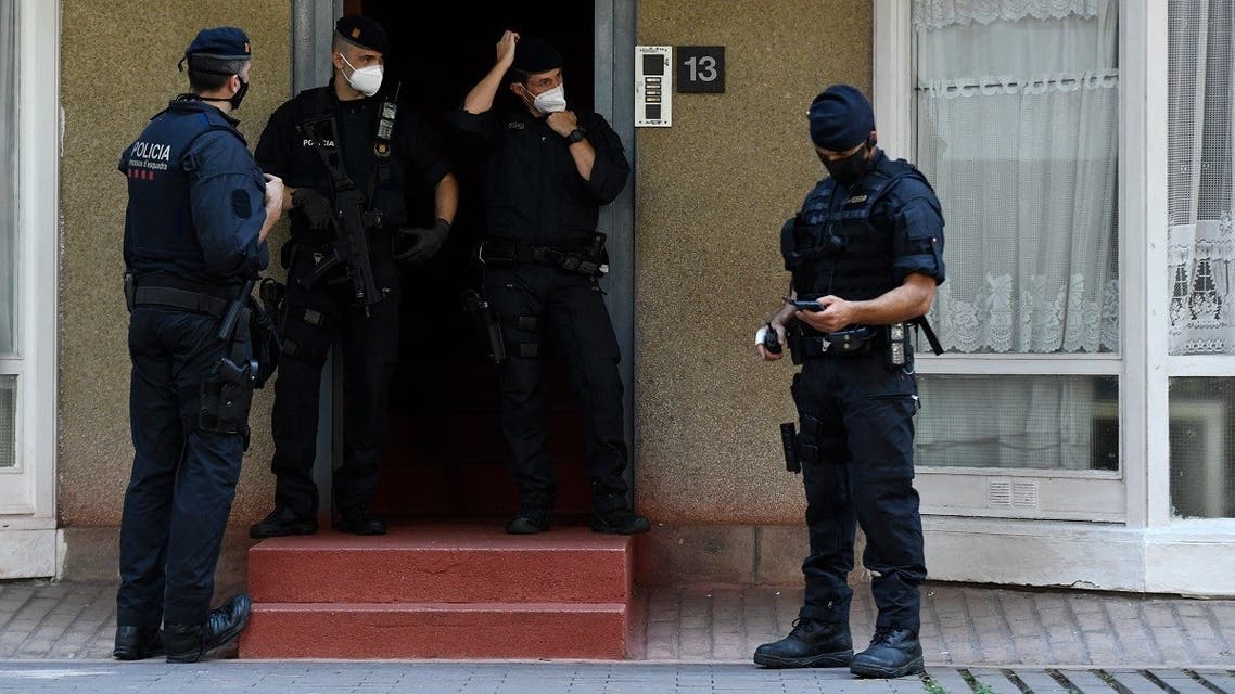 Members of the Catalan regional police force Mossos d’Esquadra stand guard during an counter-terrorism operation in Barcelona, on July 14, 2020. (Pau Barrena/AFP)