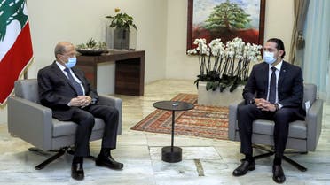 رئيس جمهورية لبنان ميشال عون والحكومة سعد الحريري (أرشيفية- فرانس برس)