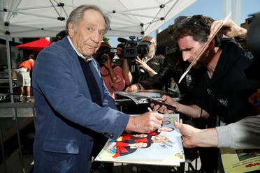 Actor George Segal signs autographs after unveiling his star on the Hollywood Walk of Fame in the Hollywood neighborhood of Los Angeles, California US, February 14, 2017. (Reuters)