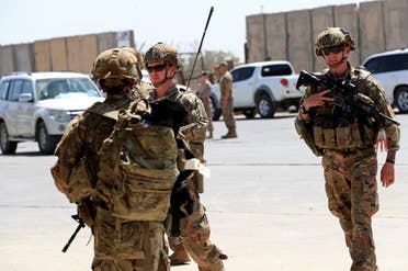جنود أميركيون ضمن قوات التحالف ينسحبون من قاعدة التاجي العام الماضي (أرشيفية)