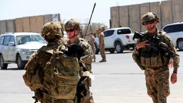 US soldiers at a handover ceremony of Taji military base from US-led coalition troops to Iraqi security forces, in the base north of Baghdad, Iraq Aug. 23, 2020. (Reuters)