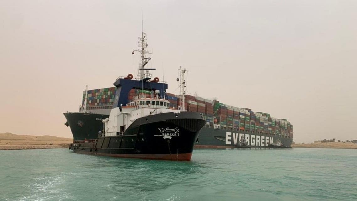 A container ship which was hit by strong wind and ran aground is pictured in Suez Canal, Egypt, on March 24, 2021. (Reuters)