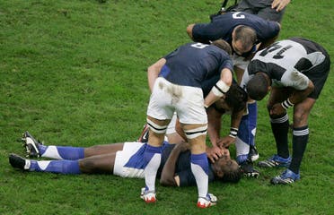 Serge Betsen of France lays on the pitch after taking a knock during the Rugby World Cup quarterfinal match between France and New Zealand at the Millennium Stadium in Cardiff, Wales, in Oct. 6, 2007. (AP)