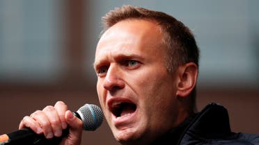 Russian opposition leader Alexei Navalny delivers a speech during a rally to demand the release of jailed protesters, who were detained during opposition demonstrations for fair elections, in Moscow, Russia September 29, 2019. REUTERS/Shamil Zhumatov/File Photo