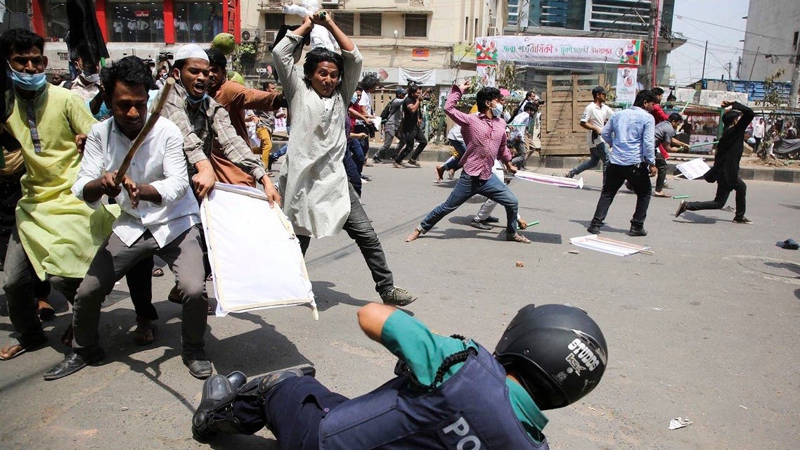 Activists from a student council clash with police during a demonstration to protest against the upcoming visit of Indian prime minister Narendra Modi, in Dhaka, on March 25, 2021. (AFP)