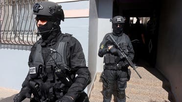 Moroccan special forces stand guard at the entrance of a building during a counter-terrorism operation in Temara, on the outskirts of Rabat, Morocco, on September 10, 2020. (Reuters)