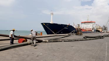 Workers prepare to unload a fuel shipment from an oil tanker at the port of Hodeidah, Yemen October 17, 2019. REUTERS/Abduljabbar Zeyad