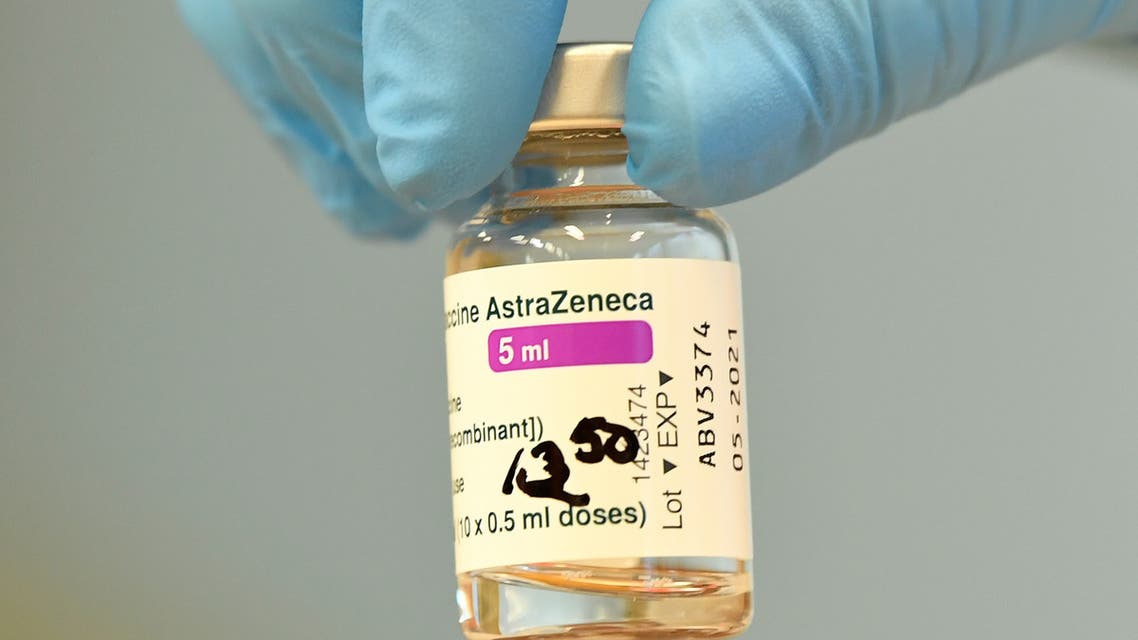 FILE PHOTO: A vial with AstraZeneca's COVID-19 vaccine is prepared during a vaccination of teachers and nursery teachers, amid the spread of the coronavirus disease (COVID-19), in Grevesmuehlen, Germany, March 5, 2021. REUTERS/Fabian Bimmer/File Photo