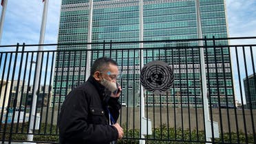 A man walks past the United Nations headquarters in New York on March 11, 2021, one year after the pandemic was officially declared. (AFP)  