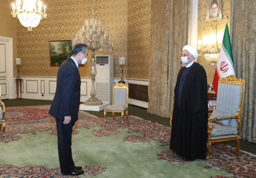 Iranian President Hassan Rouhani meets with Chinese Foreign Minister Wang Yi, in Tehran. (Reuters)
