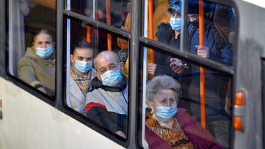 People wear masks on a crowded tram during a subway workers strike which forced commuters to use the surface public transportation in Bucharest, Romania, March 26, 2021. (AP/Andreea Alexandru) (1)