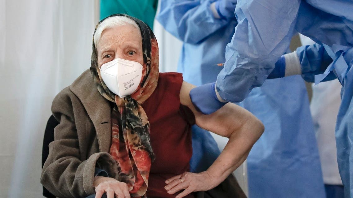 Zoea Baltag receives her second dose of the Pfizer COVID-19 vaccine in Bucharest, Romania, March 28, 2021. (AP/Vadim Ghirda)