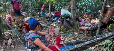 This handout from Free Burma Rangers released to AFP on March 29, 2021 shows residents seeking refuge in the jungle in eastern Myanmar's Karen state on March 28, 2021, after their area was targetted by air strikes when the Karen National Union (KNU), the Karen ethnic armed group seized a military base. (File photo: AFP)