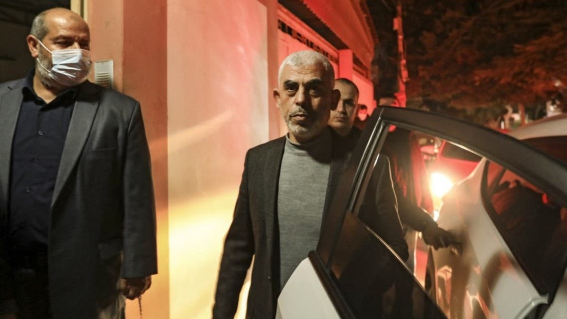 Yahya Sinwar, head of Hamas's political wing in Gaza, visits the house of fellow Hamas leader Nizar Awadallah (unseen) in Gaza City on March 10, 2021. (AFP)