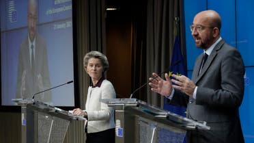 European Commission President Ursula von der Leyen (L) and European Council President Charles Michel give a presser at the end of a video conference meeting of the members of the European Council focused on the Covid-19 (novel coronavirus) pandemic, in Brussels, on January 21, 2021. (Olivier Hoslet/Pool/AFP)