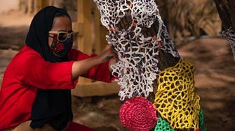 Saudi women transform 12,000 plastic bags into environmental art installation 