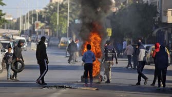 Tunisian police fire tear gas on protesters in southern city of Tataouine
