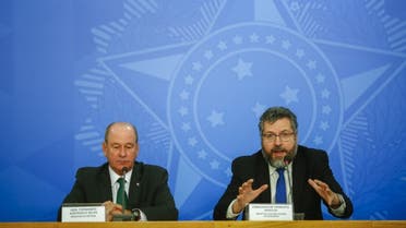  In this file photo taken on February 4, 2020 Foreign Minister Ernesto Araujo (R) speaks next to Defense Minister Fernando Azevedo e Silva during a press conference regarding the evacuation of Brazilian citizens from Wuhan. (AFP)