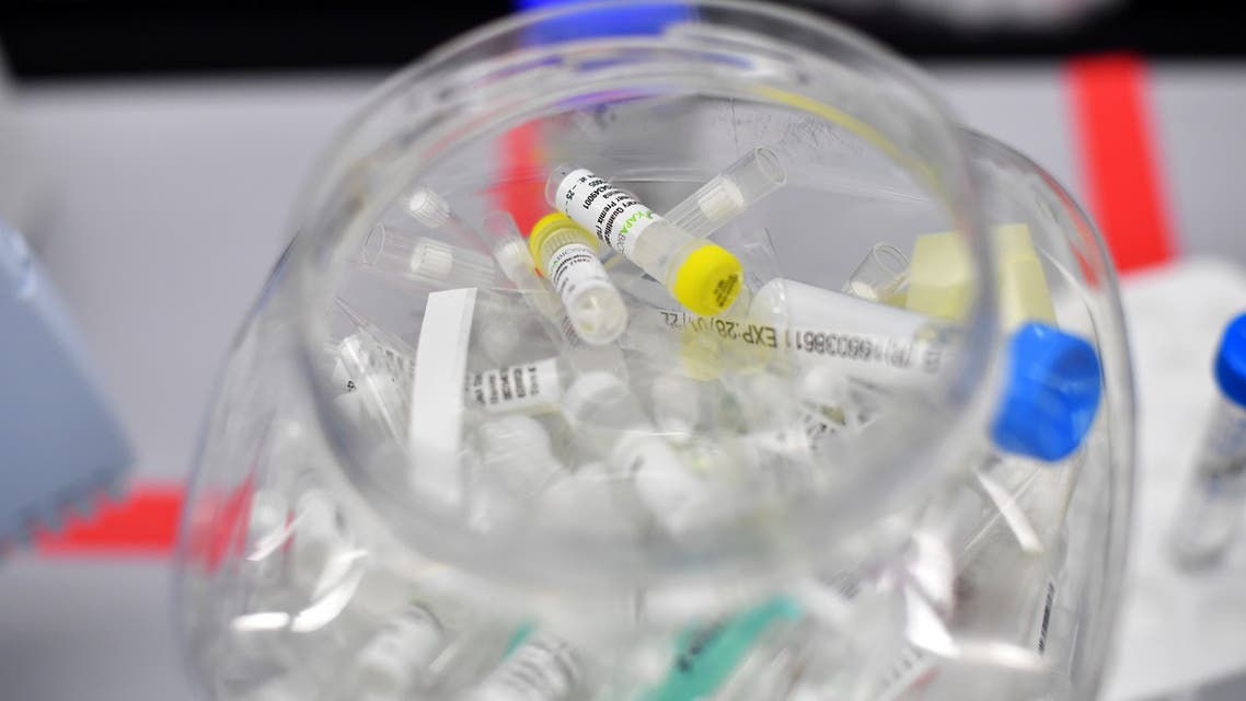 Used vials are seen at a laboratory where they sequence the novel coronavirus genomes at COVID-19 Genomics UK, on the Wellcome Sanger Institute's 55-acre campus south of Cambridge, Britain March 12, 2021. (File photo: Reuters)