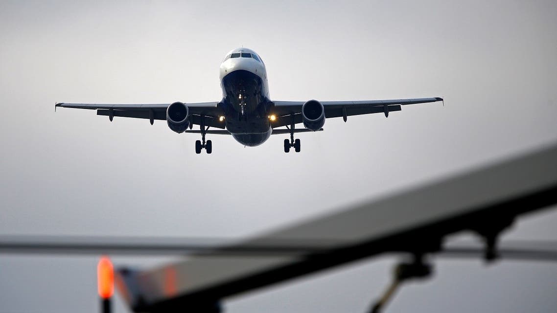 An airplane prepares to land at Cointrin airport in Geneva, Switzerland. (Reuters)