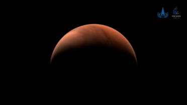 An image of Mars taken by China's Tianwen-1 unmanned probe is seen in this handout image released by China National Space Administration (CNSA) March 26, 2021. CNSA/Handout via REUTERS ATTENTION EDITORS - THIS IMAGE WAS PROVIDED BY A THIRD PARTY. NO RESALES. NO ARCHIVES.