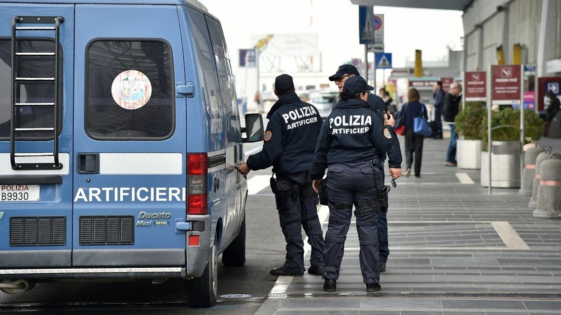 Italian police officers patrol at Rome’s Fiumicino Airport on March 22, 2016 as security measures were reinforced in the wake of attacks in Brussels. (Tiziana Fabi/AFP)