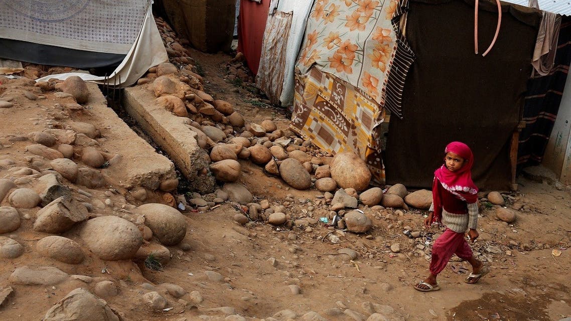 A girl belonging to Rohingya Muslim community walks past a makeshift settlement on the outskirts of Jammu, India. (File photo: Reuters)