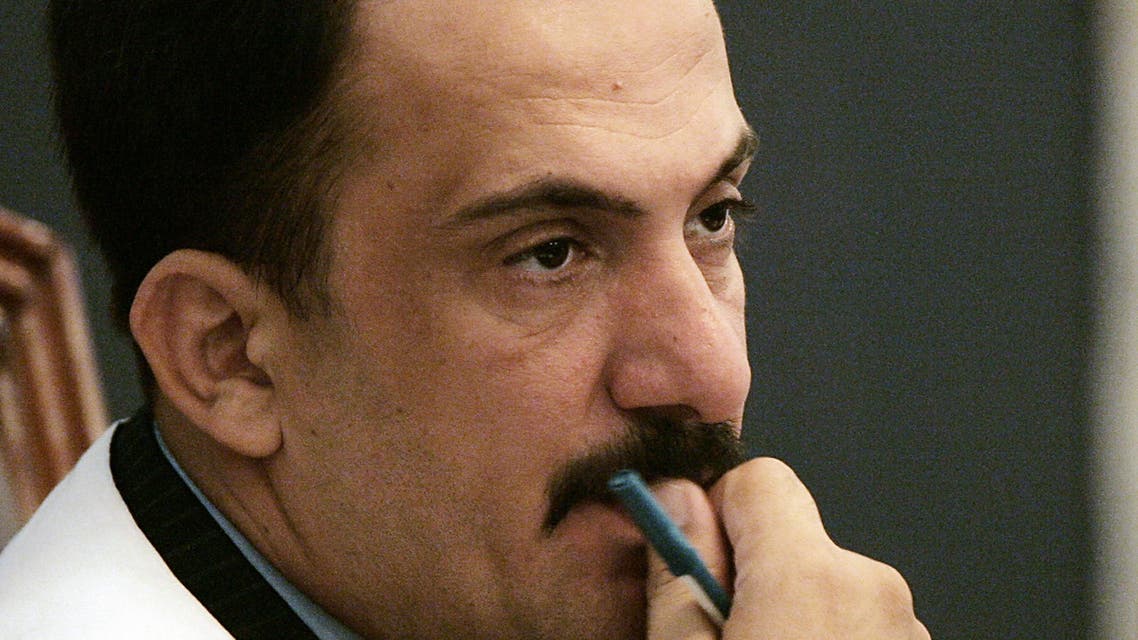 Mohammed Oreibi al-Khalifa, chief judge presiding over the trial of former Iraqi President Saddam Hussein, gestures inside the fortified Green Zone in Baghdad September 25, 2006. (Reuters)