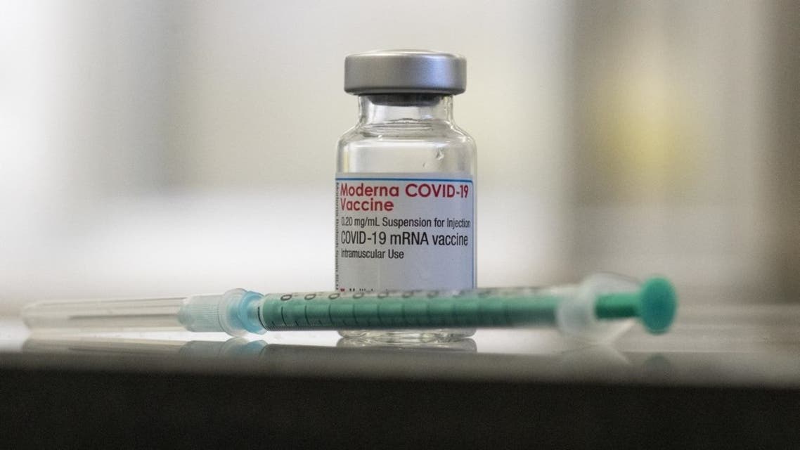 A vial containing the Covid-19 vaccine by Moderna and a syringe in Stuttgart, southern Germany, on February 12, 2021. (AFP)