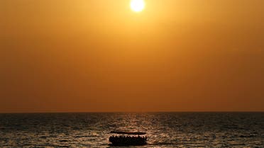 Lebanese ride a boat as they tour on the coast of Tripoli city, north Lebanon Thursday, Sept. 17, 2020. (File photo: AP)