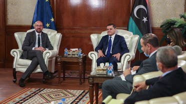Libya's interim prime minister Abdul Hamid Dbeibah (R) meets with European Council President Charles Michel at the pesidential council headquarters in the capital Tripoli, on April 4, 2021. (AFP)