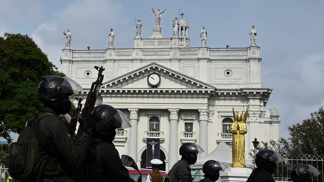 A Sri Lankan army motorcycle unit soldier patrols ahead of a Good Friday mass outside Saint Lucia’s Church in Colombo on April 2, 2021. (AFP)