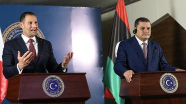 (R to L) Libya's interim prime minister Abdul Hamid Dbeibah and Malta's visiting Prime Minister Robert Abela give a joint press conference at the prime minister's office in the capital Tripoli on April 5, 2021.