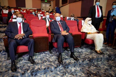 Ethiopia’s Foreign Minister Demeke Mekonnen, Egypt’s Foreign Minister Sameh Shoukry, and Sudan’s Foreign Minister Asma Mohamed Abdalla sit in a theater in the Fleuve Congo Hotel in Kinshasa in the Democratic Republic of Congo, on April 4, 2021. (Reuters)