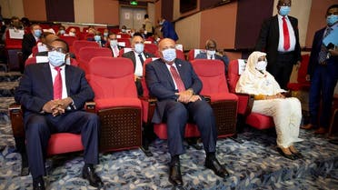 Ethiopia’s Foreign Minister Demeke Mekonnen, Egypt’s Foreign Minister Sameh Shoukry, and Sudan’s Foreign Minister Asma Mohamed Abdalla sit in a theater in the Fleuve Congo Hotel in Kinshasa in the Democratic Republic of Congo, on April 4, 2021. (Reuters)